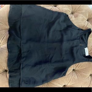Abercrombie Black sleeveless bottom frilled top.